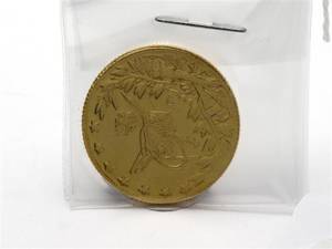 Myntliknande föremål 22K