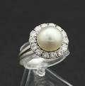 Ring mit Perle und Brillanten ca. 1.00 ct.