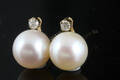 Pearl earrings with a diamond  9k gold 