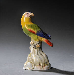 Meissen papegøje af porcelæn, dekoreret i farver og guld.