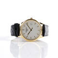 Tissot herrarmbandsur i 18 k guld 
