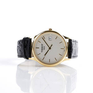 Tissot herrarmbandsur i 18 k guld 