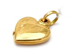 Berlock hjärta 18K