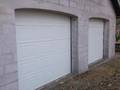 Eldrevet, leddelt garageport med fyldninger. Str. 300x260 cm. 4