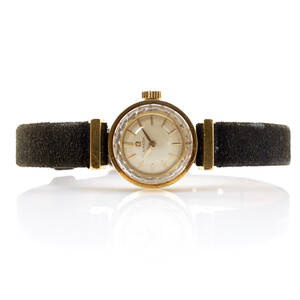 Omega damarmbandsur i 18 k 