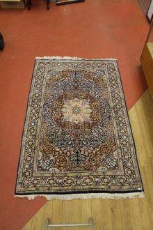 Handknuten matta 219x141cm