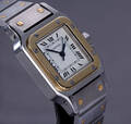 Cartier Santos Lady. Dameur i 18 kt. guld og stål med safir, 1990erne