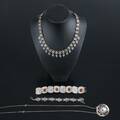 SILVERSMYCKEN halsband och armband