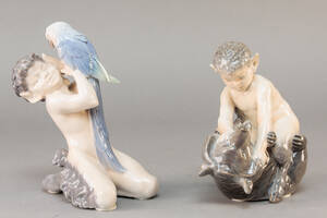 Kgl. P. Figurer af porcelæn. Faune med dyr. 2