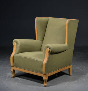 Dansk snedkermester, øreklapstol med stel af bøg  uld, 1900-tallet