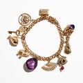 Armband 18 k guld med berlocker