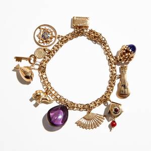 Armband 18 k guld med berlocker