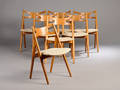 Hans J. Wegner 1914-2007. Sæt på syv savbukke stole, model CH-29 7