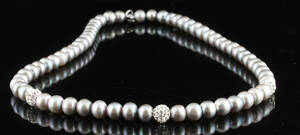 Fresh water pearl long necklace .