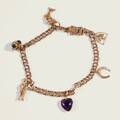 Berlockarmband 18 k guld