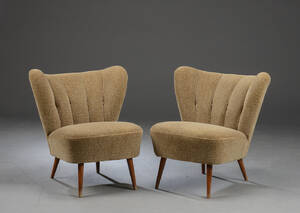 Et par lænestole betrukket med stof. 2