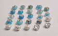23 Charlotte Borgen charms i sterling sølv, nogle med glas
