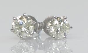 Par brillantørestikker, ca. 0.88 ct. 2