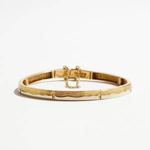 Armband 18 k röd7vitguld Lapponia
