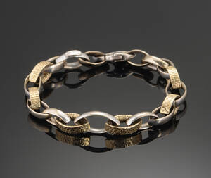 Armlænke af 14 kt guld.