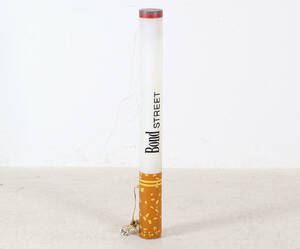 REKLAMSKYLT I FORM AV CIGARETT