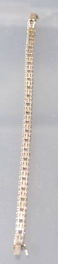 ARMBAND VITGULD 18K