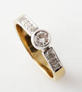 Brillant solitairering 18 kt. guld og hvidguld på ca. 0.16 ct