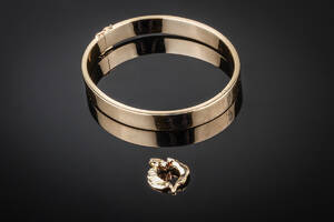 Armring og hjertevedhæng af guld 14 kt. 2