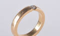 Ring i 18K guld med diamant ca 0.12 ct