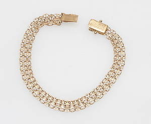 ARMBANDSKROTGULD, 18k guld, vikt ca 8,8 gr.