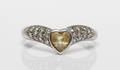 RING, 18k guld med diamanter samt hjärtslipad gul sten, svensk importstämpel. Vikt 3,1 gram.