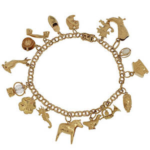 ARMBAND, 18k guld med berlocker, 20,5 gram brutto.