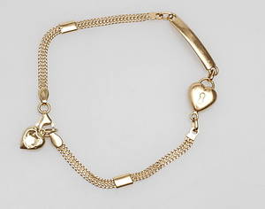 ARMBAND samt en BERLOCK,18k guld, vikt ca 5 gr.