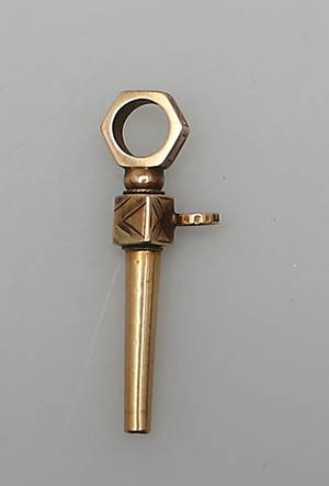 UPPDRAGNINGSNYCKEL i 18K guld.