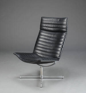 Lænestol af læder og forkromet metal. Model Sky