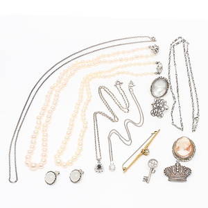 SMYCKEN, 12 delar, delvis silver. 19002000-tal.