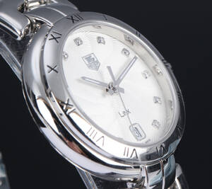 Tag Heuer Link. Stort dameur i stål med brillantbesat skive, 2010erne 