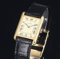Cartier Tank. Dameur i forfyldt sterlingsølv med gylden skive, 1990erne