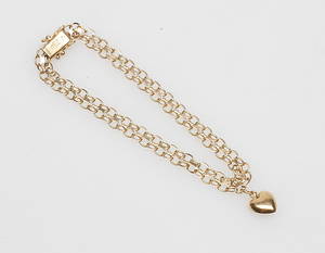 ARMBAND X-LÄNK samt EN BERLOCK, 18k guld, vikt ca 5,8 gr.