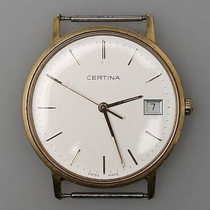 HERRARMBANDSUR. Certina. 18K Gult guld. Swiss made.