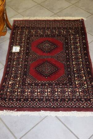 Handknuten matta 120x80