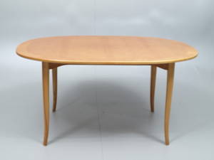 CARL MALMSTEN. Soffbord, olika träslag,Ovalen, plakettmärkt.