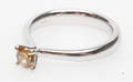 VITGULDSRING, 14k guld, med bruntonad diamant ca 0,35 ct.