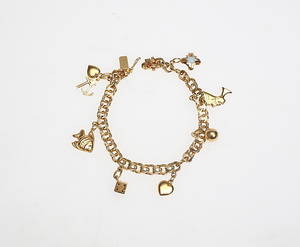 ARMBAND, med berlocker, 18 k.