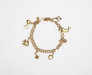 ARMBAND, med berlocker, 18 k.