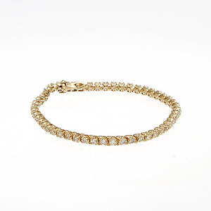 ARMLÄNK, 14K rödguld med diamanter, totalt ca 2,0 ct. Vikt 10,1 g.