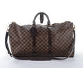4560 - Louis Vuitton. Weekendtaske, model Keepall Bandouliére 55. 