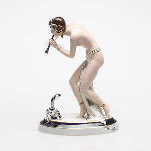 FIGURIN i porslin, ormtjuserska, Royal DUX.