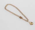 ARMBAND BISMARCK MED EN BERLOCK, 18k guld, vikt ca 5,5 gr.
