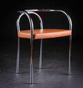 Poul Henningsen. PH Stolen, Serie 0. Blankforkromet stel betrukket med cognac farvet læder